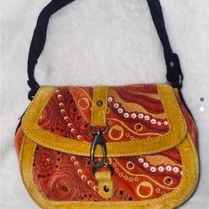 Orange, mustard, & purple BCBG
girls velour purse